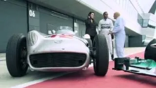 1950s F1 driver Stirling Moss meets current F1 star Lewis Hamilton.