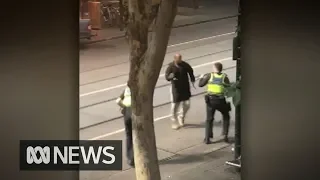 GRAPHIC VISION - Police shoot knife-wielding man in Bourke Street | ABC News