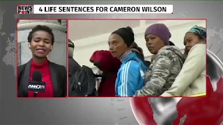 Cameron Wilson smiles and claps while sentenced to life