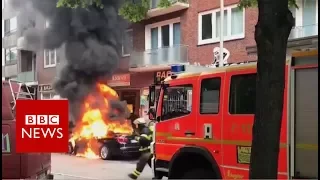 G20 SUMMIT: Burning vehicles and water cannon - BBC News