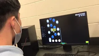 playing osu! mania at school