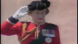 Queen Elizabeth II of the UK inspecting the troops from horseback at Trooping the Colour Parade 1986