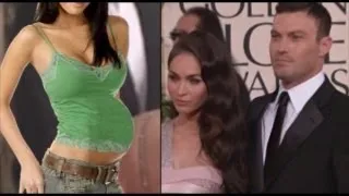 MEGAN FOX shows her BABY BUMP