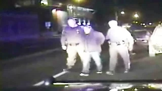 Uber shooting suspect: dashcam footage of his arrest in Kalamazoo