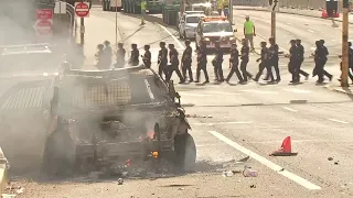 Police vehicle set on fire during violent protests in downtown Pittsburgh