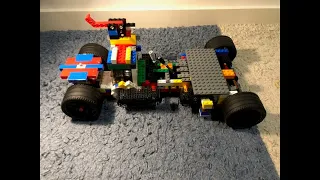 Lego vacuum engine car with throttle, gear box, steering, and rubber burnouts sneak peek).