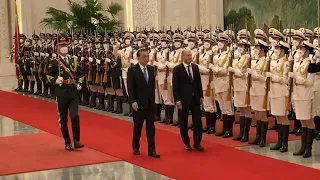 Chinese Premier Li meets German Chancellor Scholz in Beijing | AFP