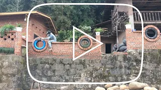 Renovating an old house in the countryside, the young man planted flowers in the small yard