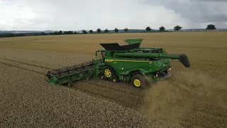 John  Deere X9 1000 harvesting wheat