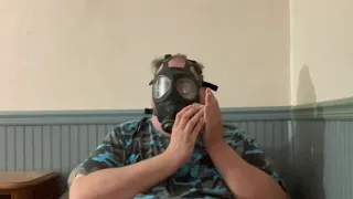 Donning a Scott M95 Gas Mask with Spectacle Inserts