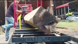 Homemade log turner at work