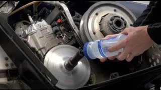 Snowmobile clutch removal, water method - very easy!  PowerModz!