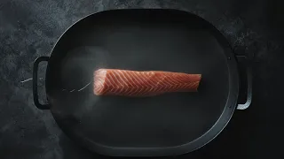 Salmon In A Pan With A Bit Of Water · Free Stock Video