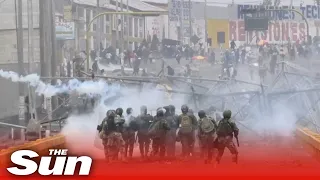 Riot police clash with anti-government protesters in Peru