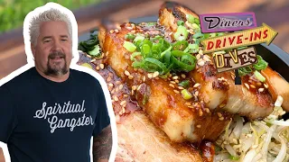 Guy Fieri Tries a Crispy Korean Pork Belly Bowl | Diners, Drive-Ins and Dives Takeout | Food Network