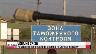 Russia's defense minister indicates need for more troops in Crimea