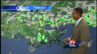 A mostly sunny to partly cloudy, hot and humid Tuesday with a few spotty showers