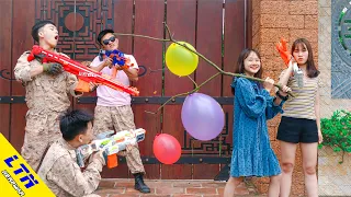 LTN Nerf War : Two Sister SEAL & Delta Force T Nerf Guns Fight Criminal Group Hold Balloons Battle