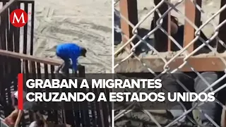 Mujer migrante logra cruzar muro fronterizo en Tijuana por pequeño hueco