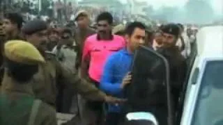 Dhoni plays football with villagers