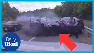 Police dash cam: Officer barely dodges out of control BMW