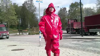 street walk in rubber and shiny red rainwear