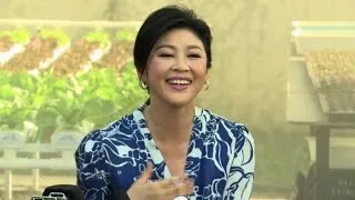 Ex-premier Yingluck takes Thai politics to the garden