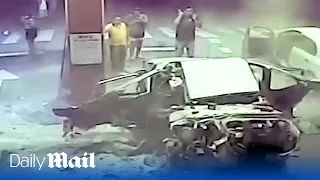 Terrifying moment car stashed with $1,500,000 worth of cocaine blows up in petrol station