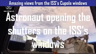 Amazing views from the Space Station Cupola as the window shutters are being opened