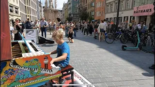 How to attract a crowd in 8 Minutes? Street Piano Performance by 11 year old boy