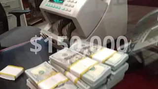 Imagine $150,000 Cash on the Counter in a Cash Counter Counting Out The Benjamins