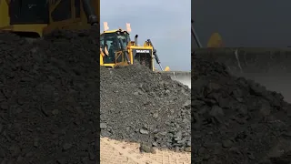Shantui DH17-c2 bulldozers working on site.