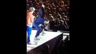 One direction hit in the balls by a shoe