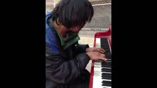 Man on the street plays beautifully