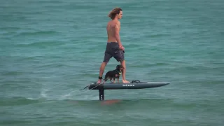 Takuma Efoil - Flying Above Water with His Dog