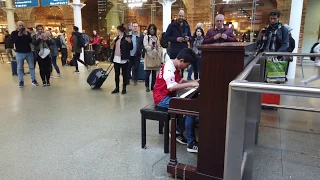 Young Football Fan Plays Bohemian Rhapsody Piano at Train Station Cole Lam 12 Years Old