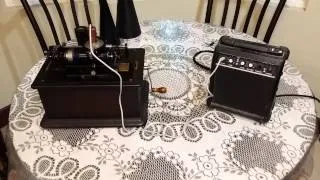 ARCHIVETTE PRO PLAYING THROUGH A GUITAR PRACTICE AMP