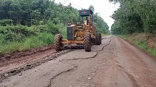 Motor Grader Crushes Damaged Asphalt To Replace With New Asphalt