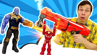Видео для мальчиков - Танос уменьшил Железного Человека! – Игры стрелялки Нерф в Автомастерской.