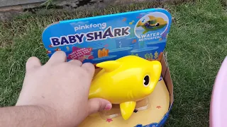 Pink fong baby shark sing and swim bath toy for babies or toddlers unboxing