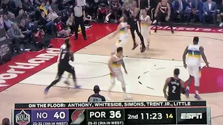 Portland-Referee Knocks Over Courtside Drinks