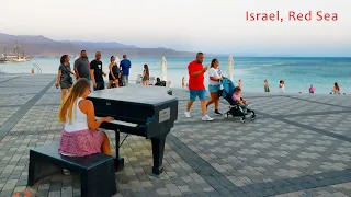 Israel. RED SEA. The City of EILAT. Walk from Evening to Night