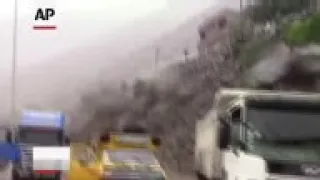 Heavy rains triggered a powerful avalanche of mud and rocks, killing at least 7 people and destroyin