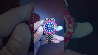 Rolex GMT Master II 126710BLRO Pepsi Bezel under UV light