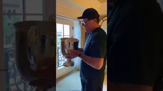 Mickelson celebrates his PGA Championship win by drinking his favorite wine at the Wanamaker Trophy