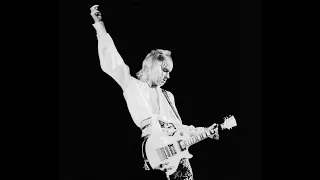 Grave of legendary musician Mick Ronson in East Hull, Yorkshire, UK.