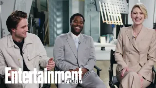 John David Washington, Robert Pattinson, & Elizabeth Debicki Dish On 'Tenet' | Entertainment Weekly