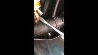 How to adjust cam chain tensioner on BMW s1000rr to eliminate rattle at startup