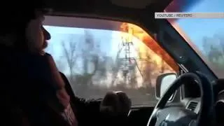 Взрыв газа и обстрелы: съемочная группа Reuters в аду Дебальцева