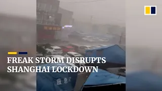 Storm rips through locked down Shanghai, tearing down Covid-19 checkpoints